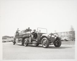 Fire truck being driven by Fire Chief George H. Magee, Santa Rosa, California, 1958 (Digital Object)