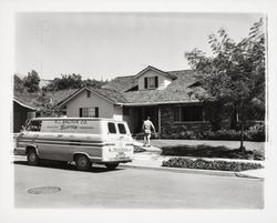 Bruner Company truck parked in front of a house, Santa Rosa, California, 1964 (Digital Object)