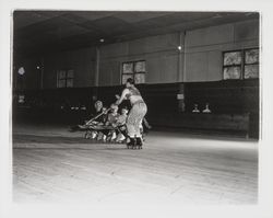 Skaters with scimitars in an Arabian Nights routine in the Skating Revue of 1957, Santa Rosa, California, April, 1957 (Digital Object)