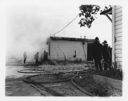 Burning down buildings in 2900 block of 4th Street, Santa Rosa, California, 1957 (Digital Object)