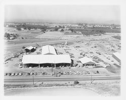 Aerial view of Stevenson Equipment Company Incorporated and Old Redwood Highway, Santa Rosa, California, 1964 (Digital Object)