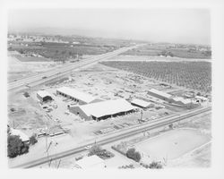 Aerial view of Stevenson Equipment Company Incorporated, US Highway 101 and Old Redwood Highway, Santa Rosa, California, 1964 (Digital Object)