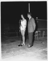 Elaine Rasmussen, California Dairy Queen, in the Aqua Varieties fashion show at the Swim Center, Santa Rosa, California, 1959 (Digital Object)