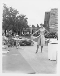 Knee-length split tunic and capris modeled at the Sword of Hope fashion show at the Flamingo Hotel, Santa Rosa, California, June 18, 1960 (Digital Object)