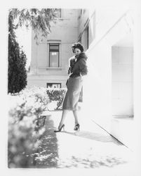 Worsted wool jacket, skirt and fur stole modeled at the Sonoma County Courthouse, Santa Rosa, California, 1959 (Digital Object)