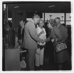 David Zumwalt and attendees at the the Zumwalt Chrysler-Plymouth Center Open House, Santa Rosa, California, 1971 (Digital Object)