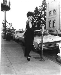 Women in evening gowns on Hinton Avenue, Santa Rosa, California, 1964 (Digital Object)