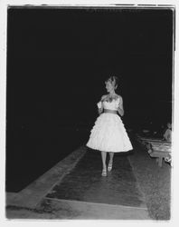 Layered strap dress modeled in the Sword of Hope fashion show at the Flamingo Hotel, Santa Rosa, California, 1960 (Digital Object)