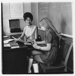 Mrs. Lillian Gorwig working with a student in her shorthand class at Luther Burbank College of Commerce, Santa Rosa, California, 1971 (Digital Object)