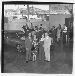 David Zumwalt, Jill Zumwalt, Elinor Zumwalt and Ed Zumwalt at the Zumwalt Chrysler-Plymouth Center Open House, Santa Rosa, California, 1971 (Digital Object)