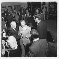 Ed Zumwalt and David Zumwalt and others at the Zumwalt Chrysler-Plymouth Center Open House, Santa Rosa, California, 1971 (Digital Object)