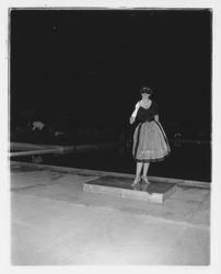 Black and checked dress modeled in the Sword of Hope fashion show at the Flamingo Hotel, Santa Rosa, California, 1960 (Digital Object)