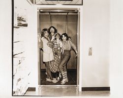 Four clowns in the elevator at Sears, Santa Rosa, California, 1980 (Digital Object)