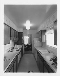 Kitchen of a Young America model home at Oak Lake Green subdivision, Petaluma, California, 1964 (Digital Object)