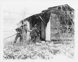 Burning down buildings in 2900 block of 4th Street, Santa Rosa, California, 1957 (Digital Object)