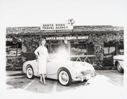 Claire C. Bramwell and her Sprite in front of Santa Rosa Travel, Santa Rosa, California, 1959 (Digital Object)
