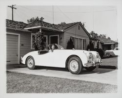 Karl Hullen in his Jaguar at his home, Santa Rosa, California, 1957 (Digital Object)