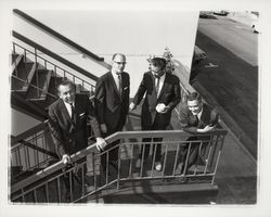 Four men on the steps of the parking garage at 3rd and D St., Santa Rosa , California, 1964 (Digital Object)