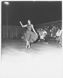 Jonelle Johnson, Miss Marysville-Yuba City, modeling a tunic dress and capri ensemble in the Aqua Varieties fashion show at the Swim Center, Santa Rosa, California, 1959 (Digital Object)