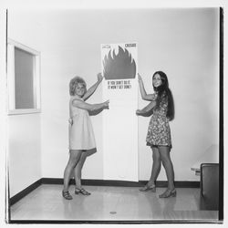 Putting up an United Crusade poster, Santa Rosa, California, 1971 (Digital Object)