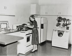 Margaret Peck in the kitchen, Santa Rosa, California, 1957 (Digital Object)