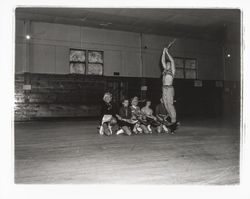 Skaters with scimitars in an Arabian Nights routine in the Skating Revue of 1957, Santa Rosa, California, April, 1957 (Digital Object)