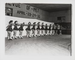 Line of skaters linking arms in the Skating Revue of 1957, Santa Rosa, California, April, 1957 (Digital Object)