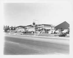 Old Redwood Highway frontage of Stevenson Equipment Company Incorporated, Santa Rosa, California, 1964 (Digital Object)