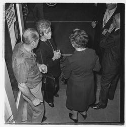 Three attendees at the Zumwalt Chrysler-Plymouth Center Open House, Santa Rosa, California, 1971 (Digital Object)
