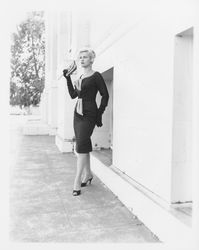 Black pencil dress modeled outside the Sonoma County Courthouse, Santa Rosa, California, 1959 (Digital Object)