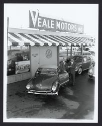 Dick From taking delivery of the first Ghia convertible from Darrold Parks, Santa Rosa, California, 1958 (Digital Object)