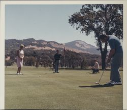 Playing golf at Bennett Valley Golf Course, Santa Rosa, California, 1970 (Digital Object)