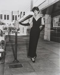 Women in evening gowns on Hinton Avenue, Santa Rosa, California, 1964 (Digital Object)