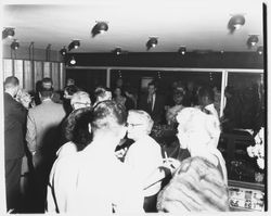 Crowd of opening night attendees inside Ceci&#39;s Flamingo Shop, Santa Rosa, California, 1957 (Digital Object)