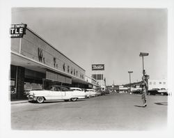 Barb Neeley in front of W.T. Grant Co. in Montgomery Village, Santa Rosa, California, 1959 (Digital Object)