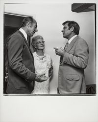 John Downey talking with two people at Empire Dental Clinic open house, Santa Rosa, California, 1971 (Digital Object)