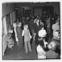 Attendees mingle at the Zumwalt Chrysler-Plymouth Center Open House, Santa Rosa, California, 1971 (Digital Object)