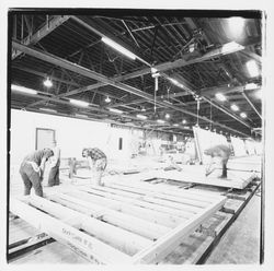 Workers construct portable building walls at Speedspace Corporation, 920 Shiloh Road, Windsor, California, 1971 (Digital Object)