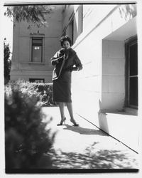 Worsted wool coat and fur stole modeled at the Sonoma County Courthouse, Santa Rosa, California, 1959 (Digital Object)