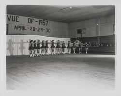 Line of skaters linking arms in the Skating Revue of 1957, Santa Rosa, California, April, 1957 (Digital Object)
