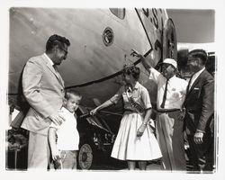 Marie Hindringer, Miss Sonoma County christening an airplane and Coddingtown Airport, Santa Rosa , California, 1960 (Digital Object)