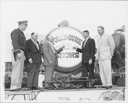 Dutch Flohr and four other men in front of sign for Foley &amp; Burk Shows, Santa Rosa, California, 1958 (Digital Object)