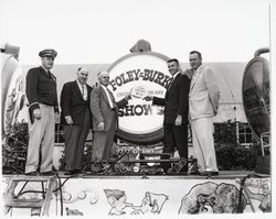 Dutch Flohr and four other men in front of sign for Foley &amp; Burk Shows, Santa Rosa, California, 1958 (Digital Object)