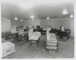 Caskets displayed at Welti Chapel of the Roses, Santa Rosa, California, 1957 (Digital Object)