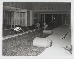 Laying carpet at the Flamingo Hotel, Santa Rosa, California, 1957 (Digital Object)