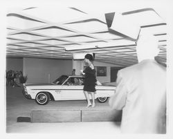 Balk layered dress modeled in a fashion show at dedication of parking garage at 3rd and D, Santa Rosa, California, 1964 (Digital Object)