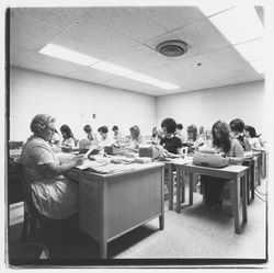 Instructor and students in a business correspondence or typing class at Luther Burbank College of Commerce, Santa Rosa, California, 1971 (Digital Object)