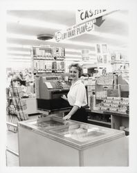 Barbara Neeley, cashier at W.T. Grant, Santa Rosa, California, 1959 (Digital Object)