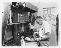 Technician at a workbench in M. L. Bruner Company, Santa Rosa, California, 1964 (Digital Object)