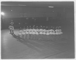 Line of roller skaters at the Skating Revue of 1957, Santa Rosa, California, April, 1957 (Digital Object)